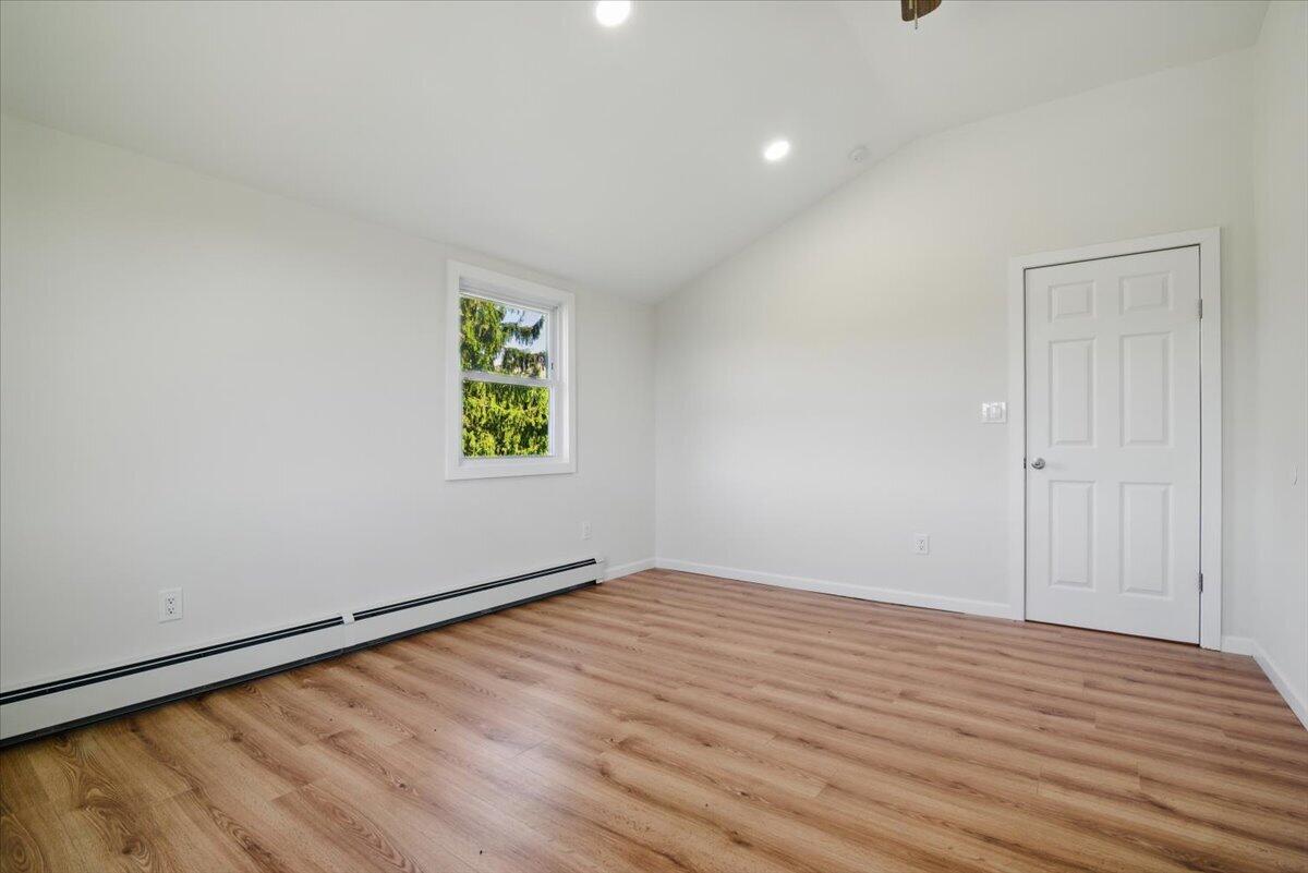 1652 Bonser Road Saylorsburg, PA 18353 - Photo 34 of 62 wooden floor in an empty room with a window