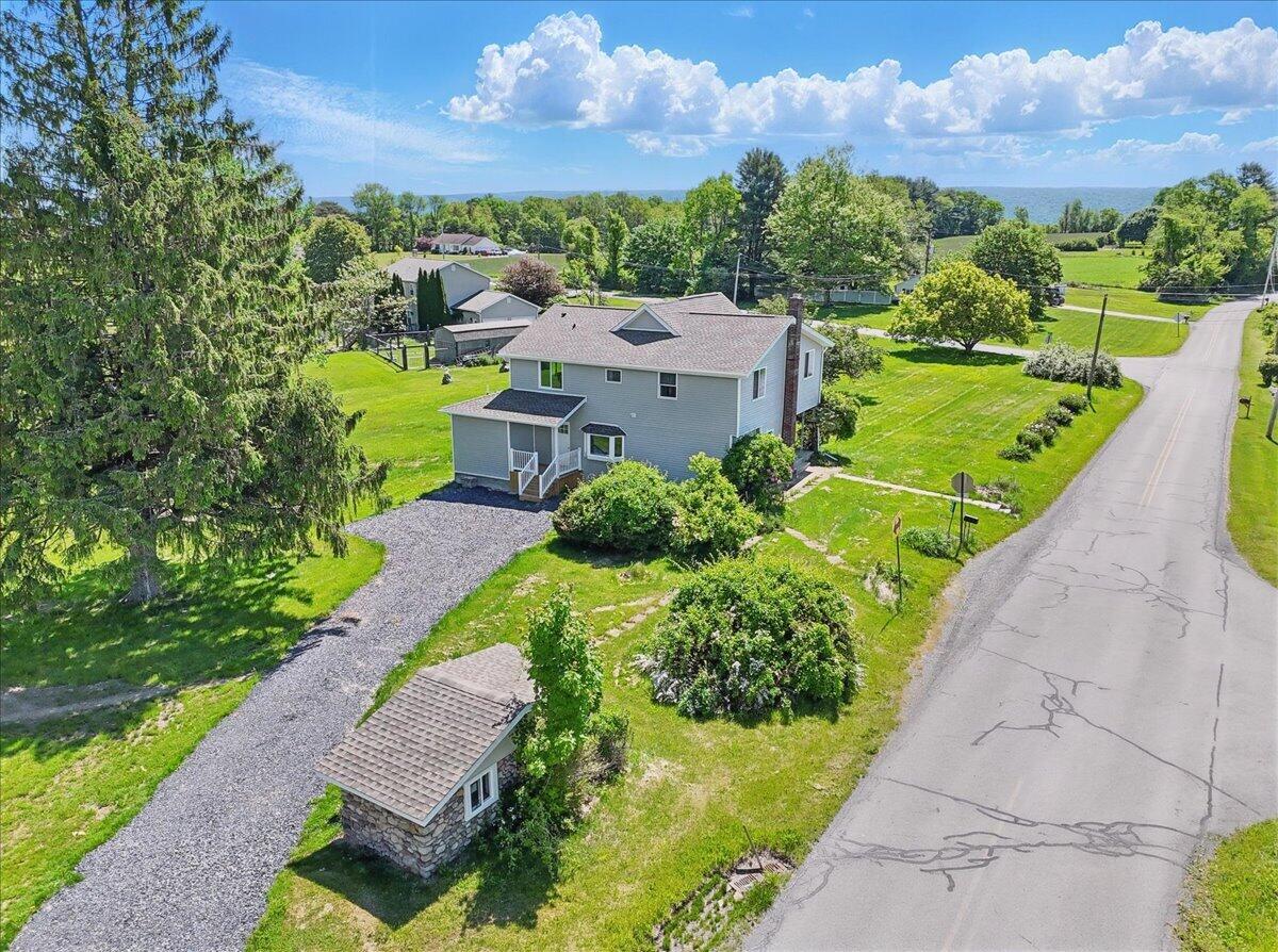 1652 Bonser Road Saylorsburg, PA 18353 - Photo 50 of 62 a view of a garden with houses