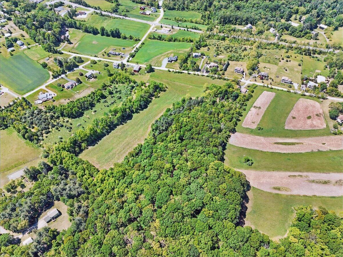 1652 Bonser Road Saylorsburg, PA 18353 - Photo 61 of 62 an aerial view of a house with a yard basket ball court and outdoor seating