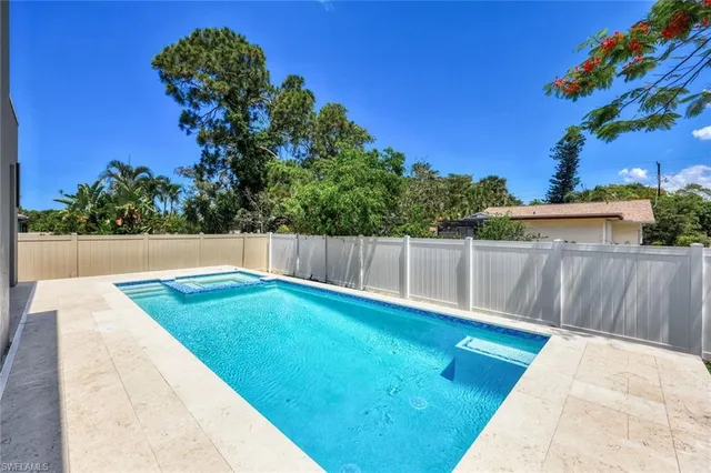 a view of an outdoor space with a swimming pool