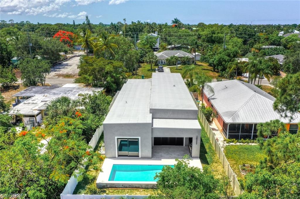 1297 Trail Terrace Drive Naples, FL 34103 - Photo 26 of 29 an aerial view of a house