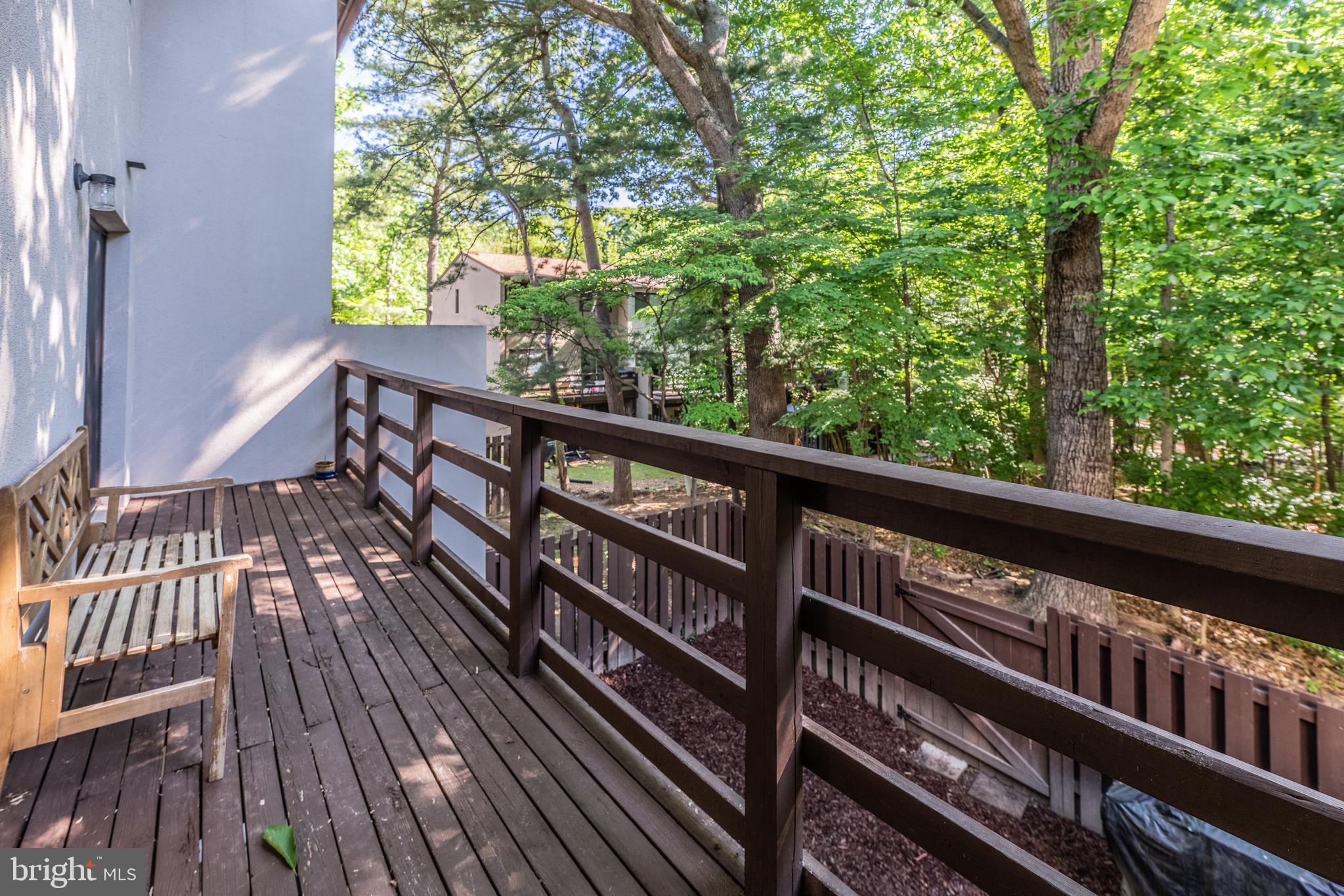 11917 Barrel Cooper Court Reston, VA 20191 - Photo 19 of 59 a view of balcony with wooden floor and outdoor seating