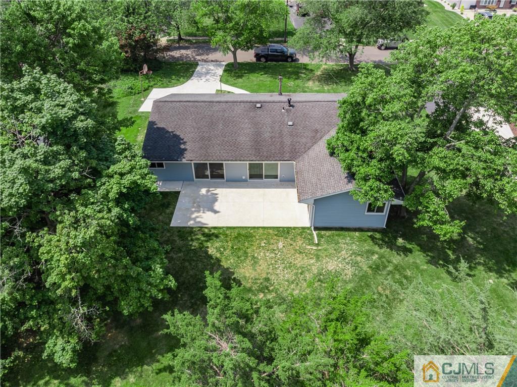 15 Pelham Road Kendall Park, NJ 08824 - Photo 2 of 26 an aerial view of a house with a yard