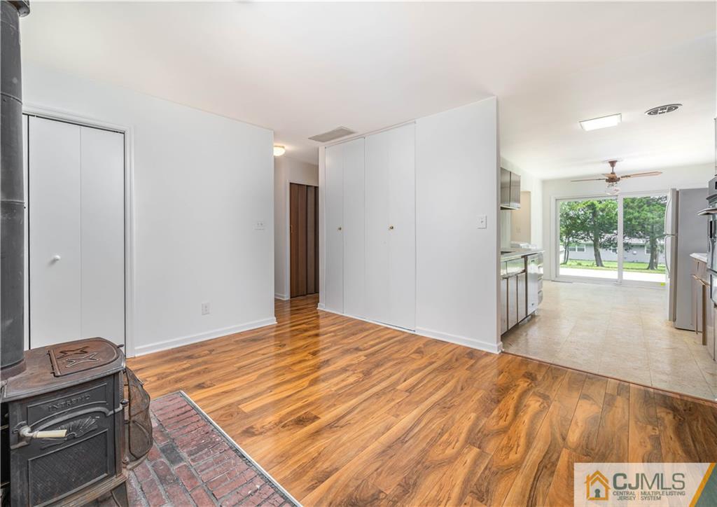 15 Pelham Road Kendall Park, NJ 08824 - Photo 16 of 26 a view of a livingroom with wooden floor