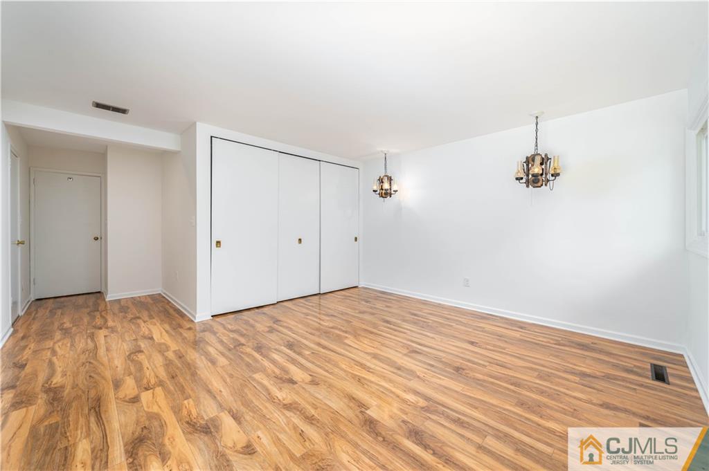 15 Pelham Road Kendall Park, NJ 08824 - Photo 23 of 26 a view of empty room with ceiling fan