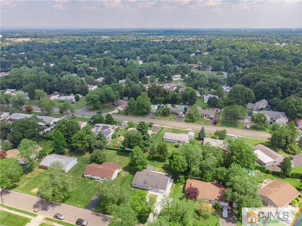 15 Pelham Road Kendall Park, NJ 08824 - Photo 4 of 26 an aerial view of a houses with outdoor space and street view