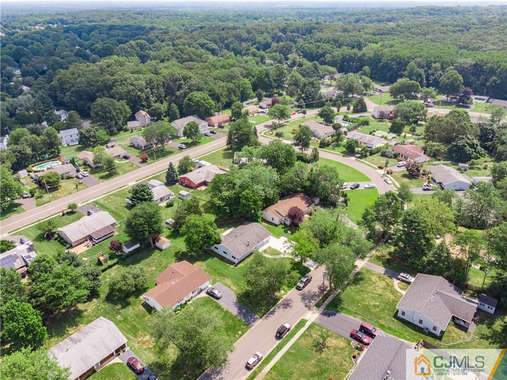 15 Pelham Road Kendall Park, NJ 08824 - Photo 5 of 26 an aerial view of residential houses with outdoor space and trees