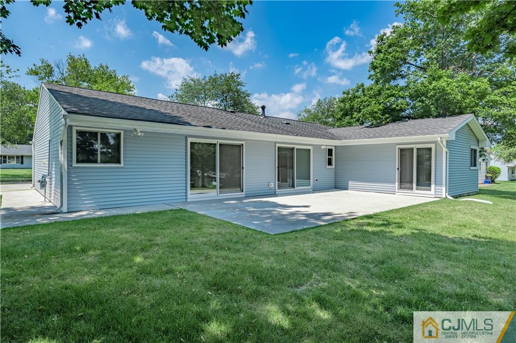 15 Pelham Road Kendall Park, NJ 08824 - Photo 8 of 26 a view of an house with backyard space and garden