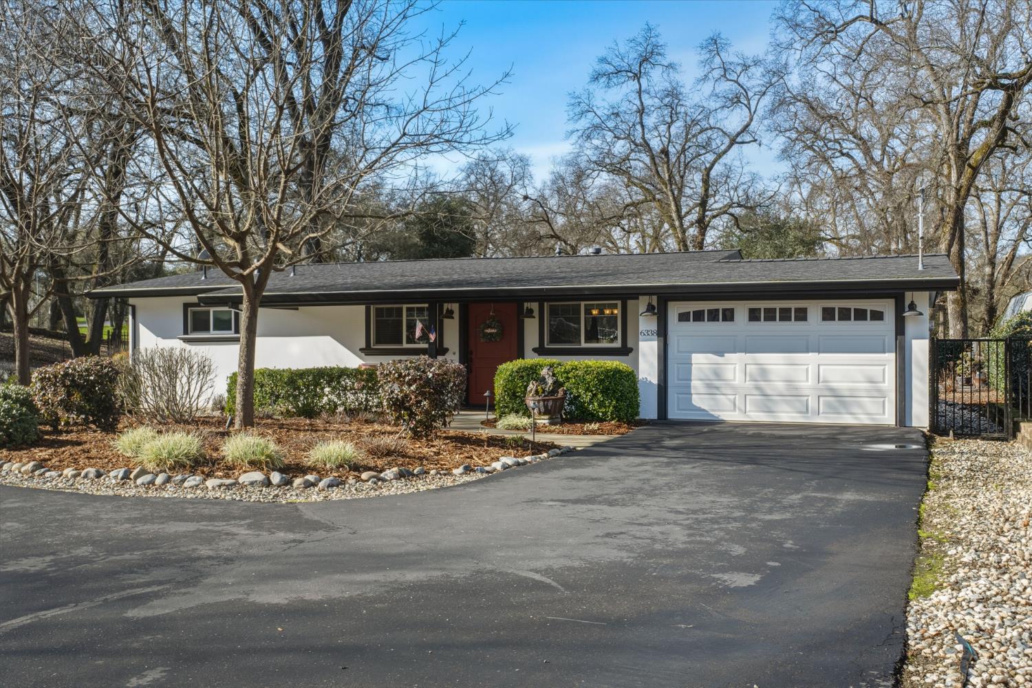 6338 Horseshoe Bar Road Loomis, CA 95650 - Photo 1 of 1 a front view of house with yard and green space