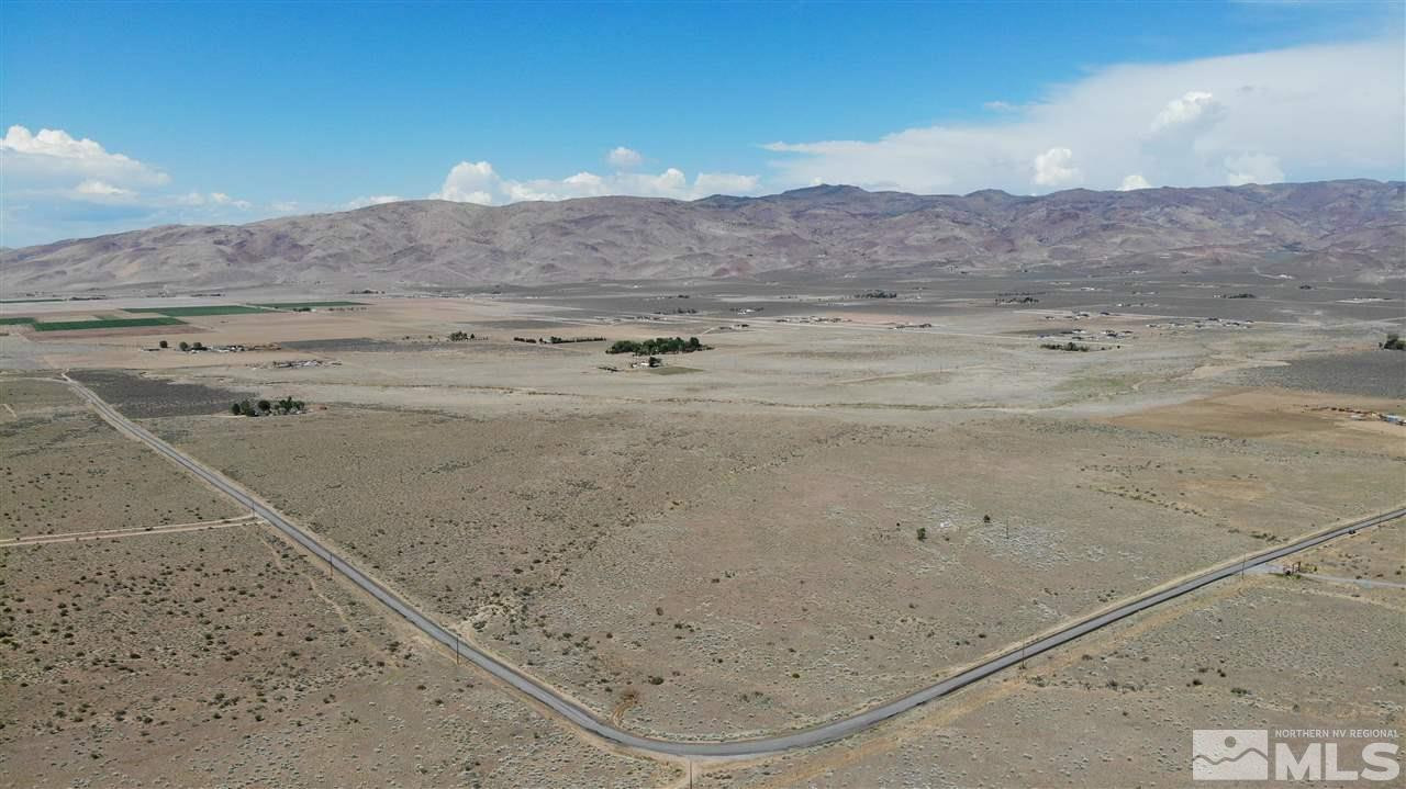 305 Ironwood Road Reno, NV 89510 - Photo 1 of 12 a view of a dry yard with mountain
