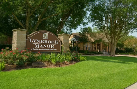 a view of a park that has sign board