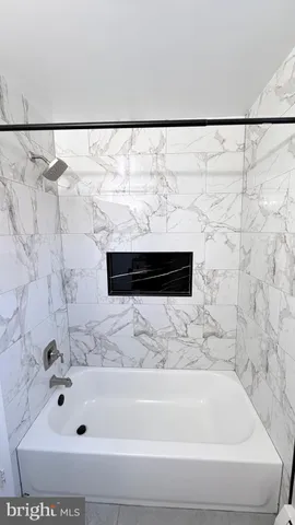 a bathroom with a bathtub