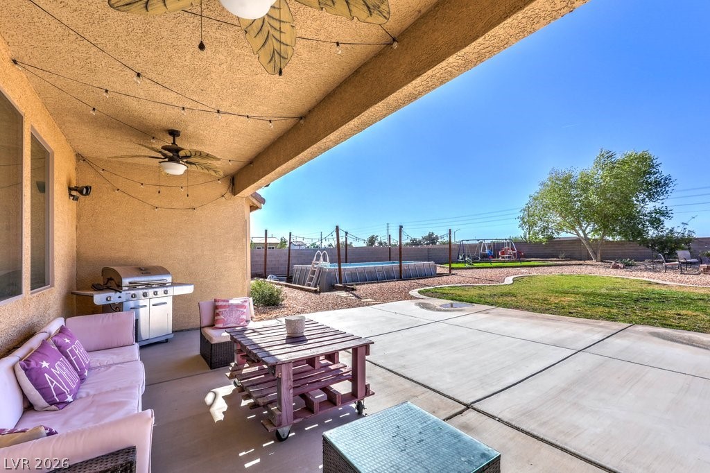 1593 Valley Home Court Logandale, NV 89021 - Photo 36 of 57 Back patio with ceiling fans.