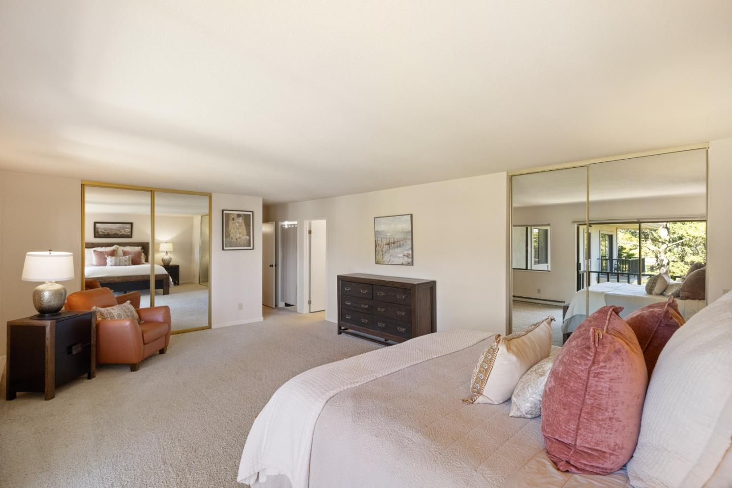 4 Ocean Pines Lane Pebble Beach, CA 93953 - Photo 20 of 49 a spacious bedroom with a bed and furniture