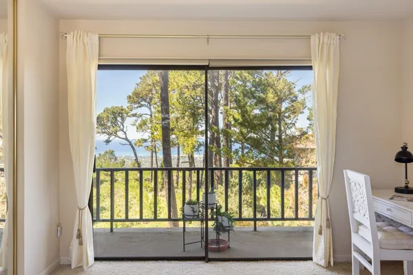 a view of a large window with an outdoor view