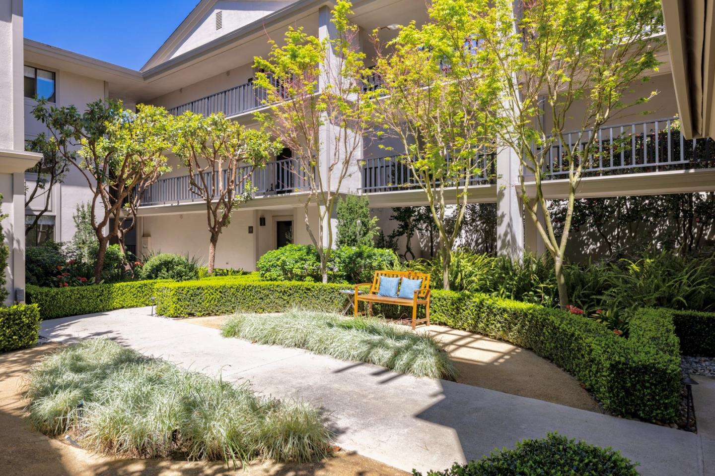 4 Ocean Pines Lane Pebble Beach, CA 93953 - Photo 3 of 49 a view of a garden with a fountain