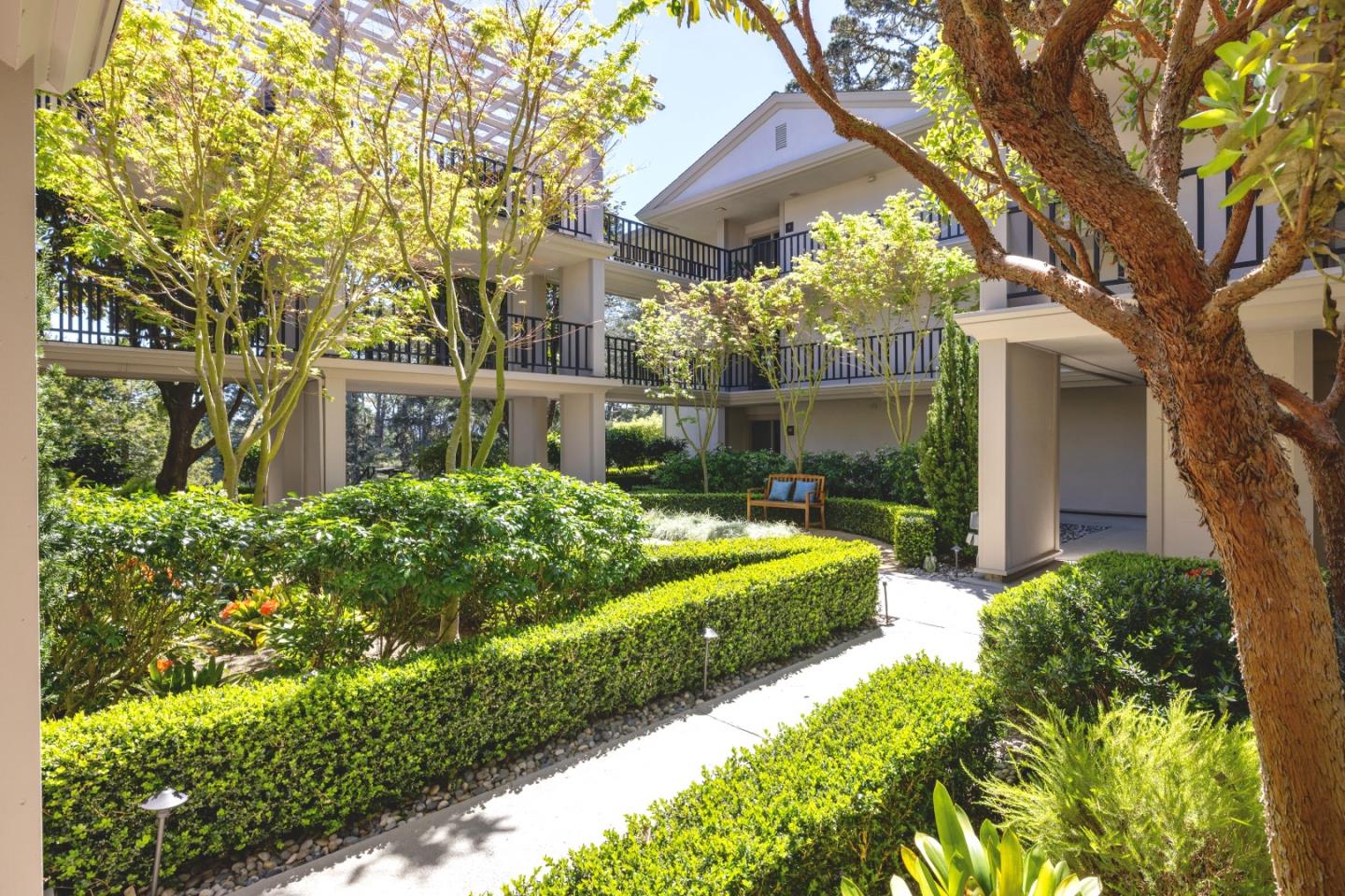 4 Ocean Pines Lane Pebble Beach, CA 93953 - Photo 35 of 49 a view of a garden with a fountain