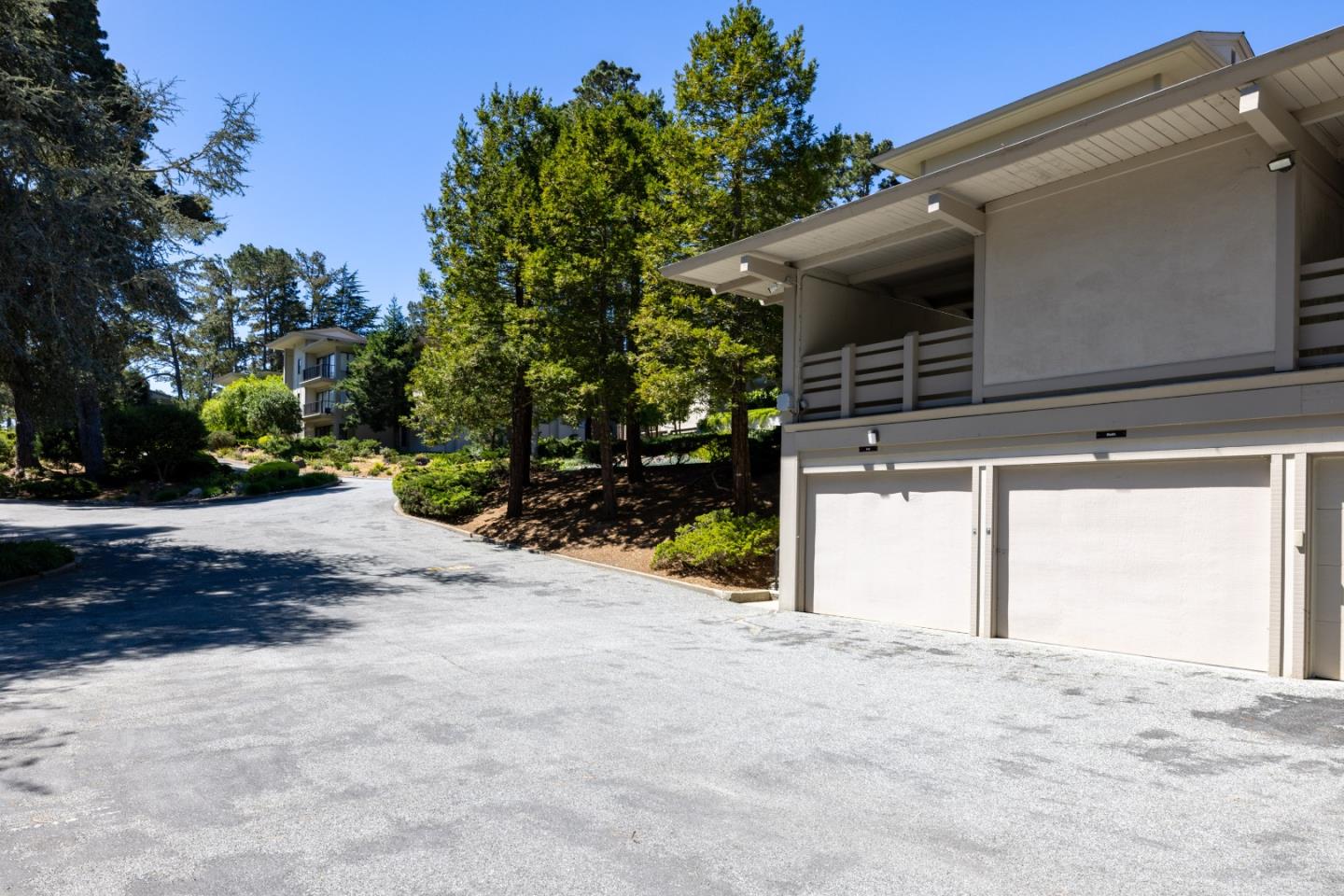 4 Ocean Pines Lane Pebble Beach, CA 93953 - Photo 41 of 49 a view of a house with a yard