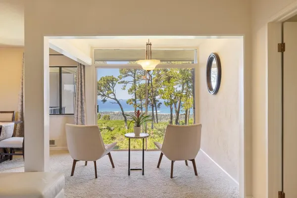 a workspace with furniture and a window