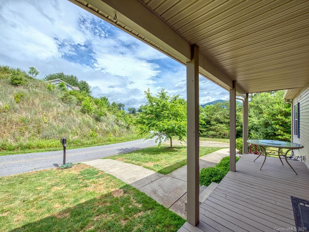 81 Relief Loop Clyde, NC 28721 - Photo 11 of 39 a view of a porch with a yard