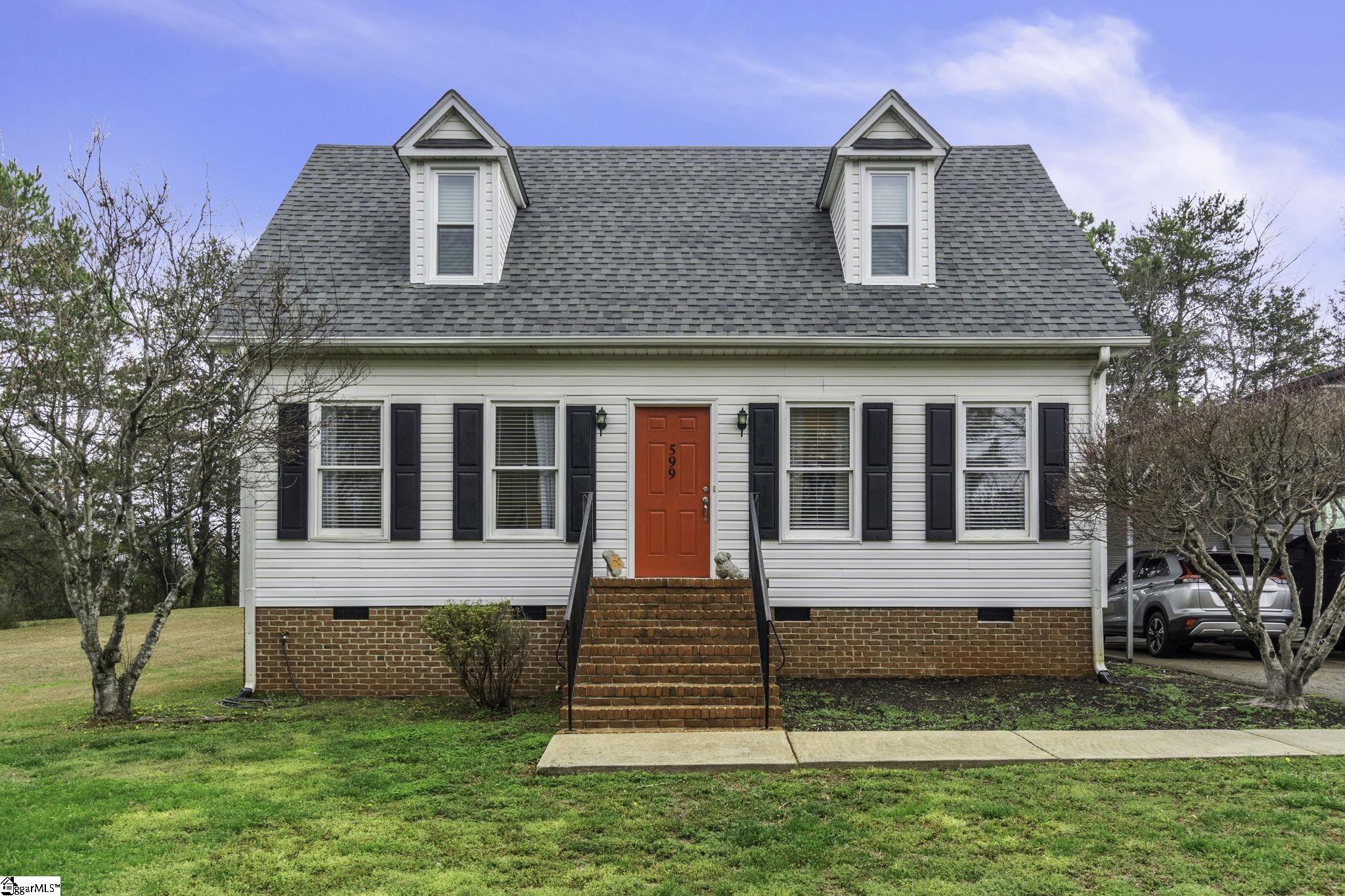 Great curb appeal and sits way off of the road with a nice lock driveway.