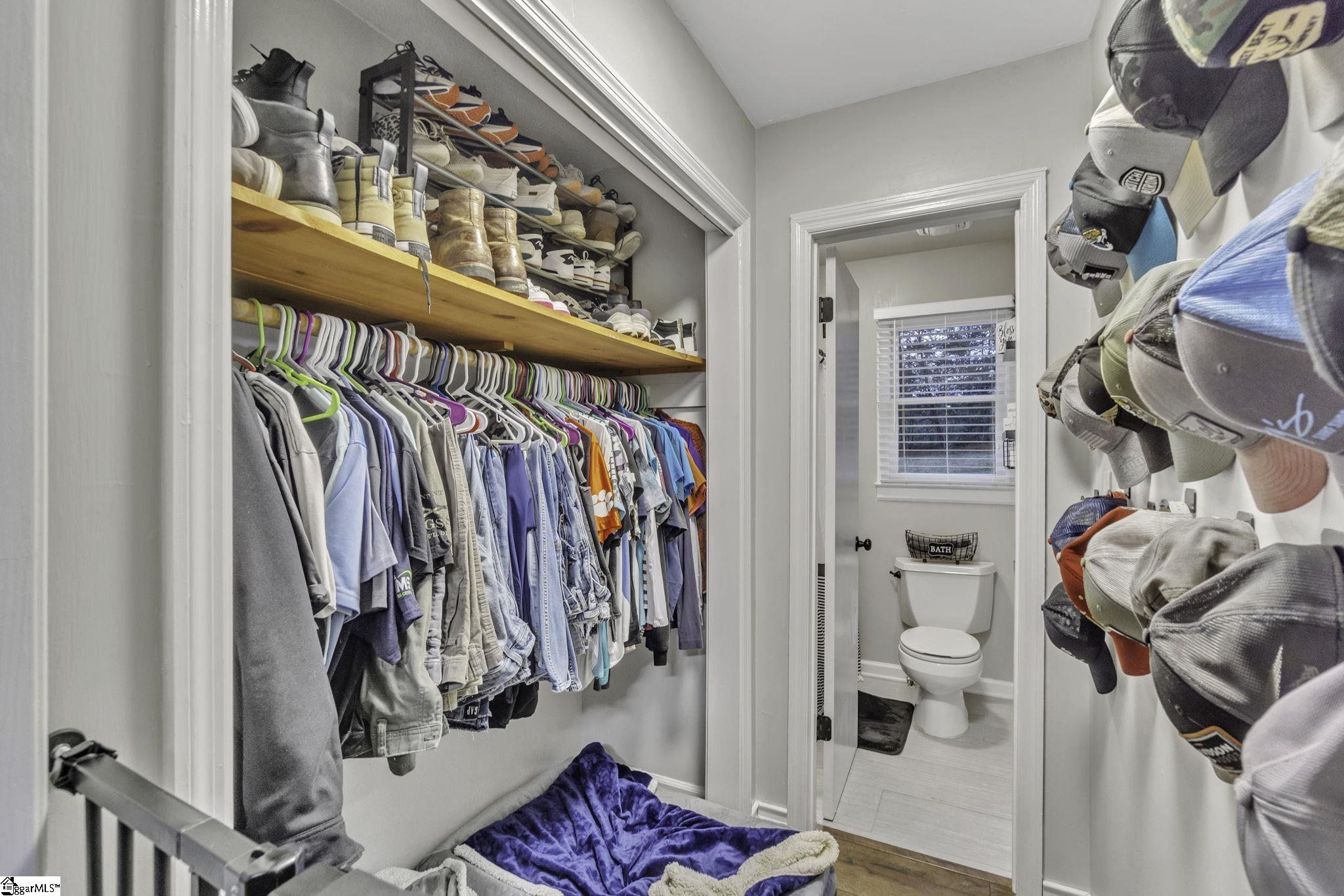 599 Sheriff Mill Road Easley, SC 29642 - Photo 13 of 29 The Primary Bedroom adjoins the ensuite bathroom with this walk through closet.