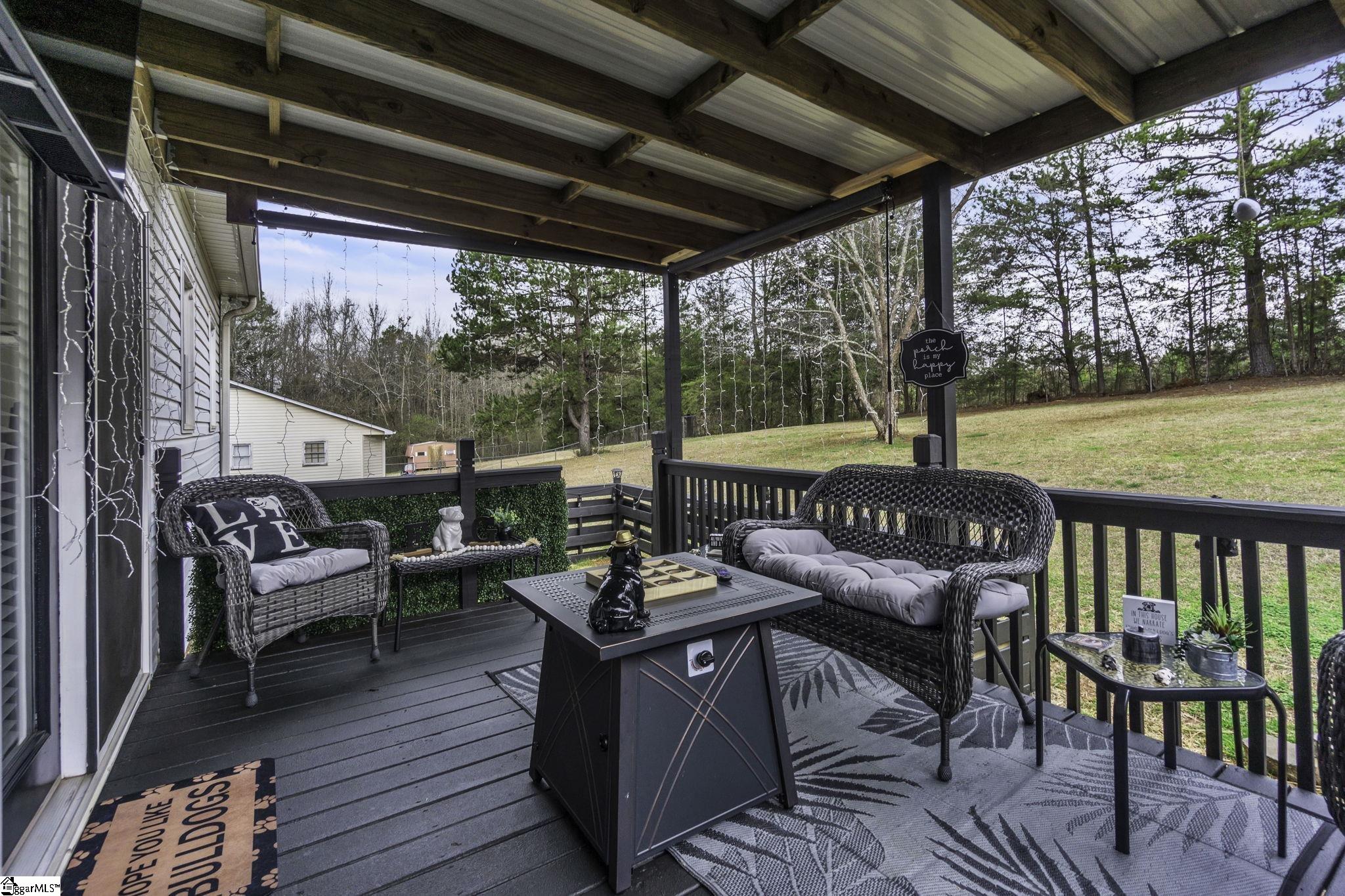 599 Sheriff Mill Road Easley, SC 29642 - Photo 20 of 29 You will love the back porch. Such a comfortable area to just relax.