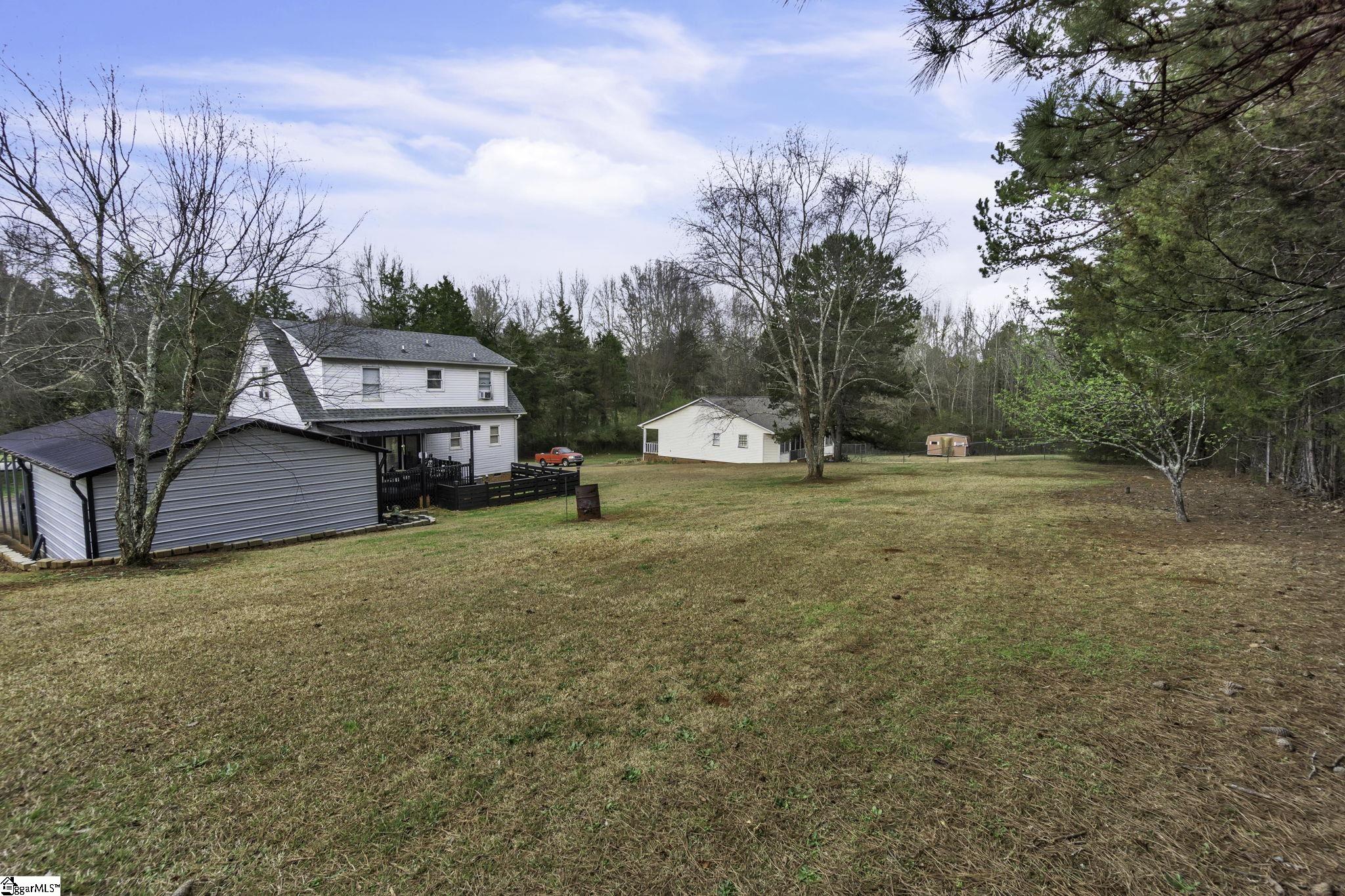 599 Sheriff Mill Road Easley, SC 29642 - Photo 22 of 29 Large backyard with view of the detached garage