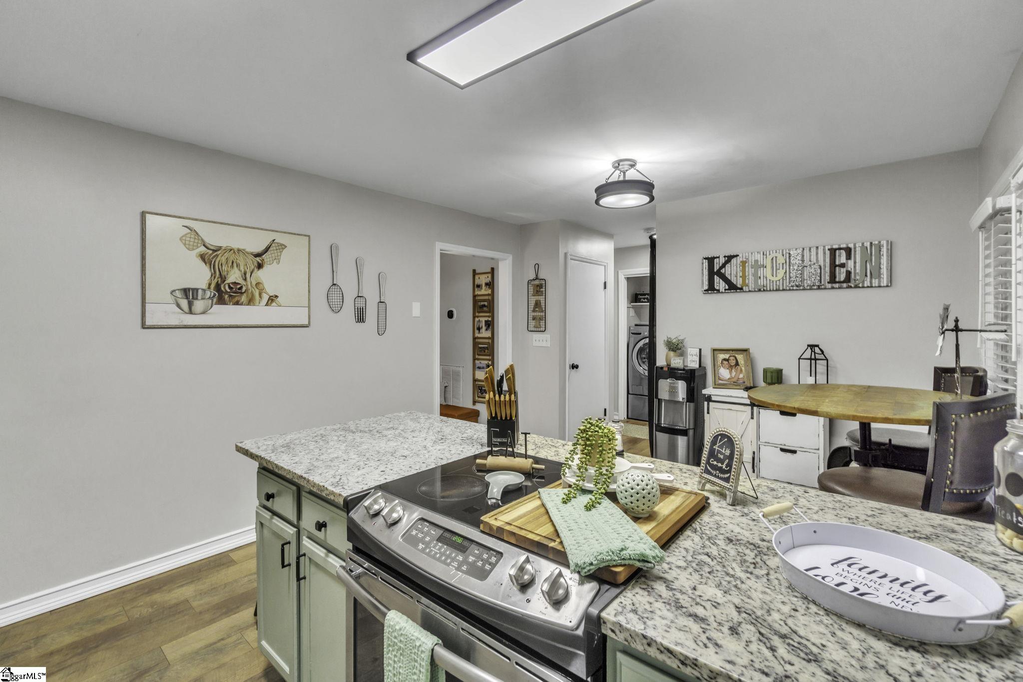 599 Sheriff Mill Road Easley, SC 29642 - Photo 8 of 29 Kitchen is open to Dining area. This view also shows position of range.