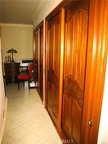 a room with lots of appliances and windows