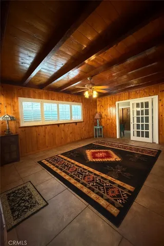 a view of a backyard with sitting area