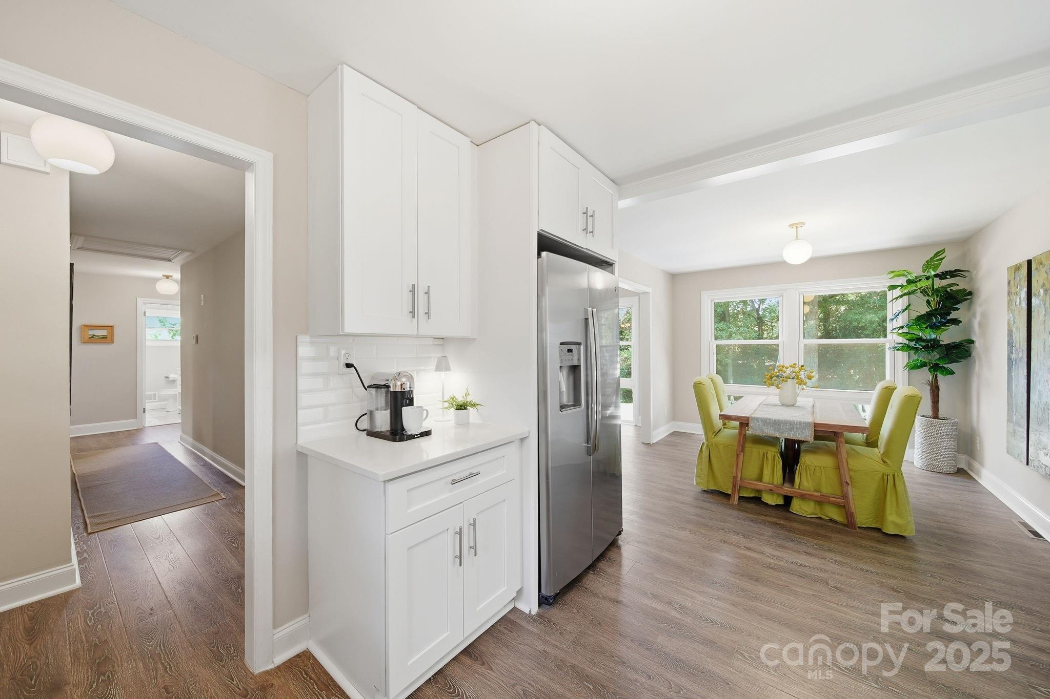 5631 Londonderry Road Charlotte, NC 28210 - Photo 14 of 32 a view of living room and dining room with furniture