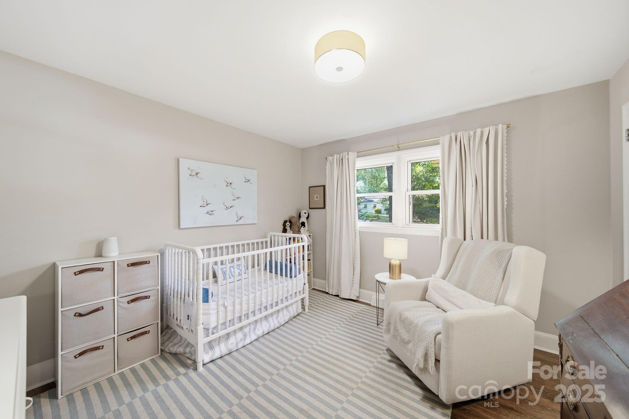 5631 Londonderry Road Charlotte, NC 28210 - Photo 23 of 32 a bedroom with furniture and white walls