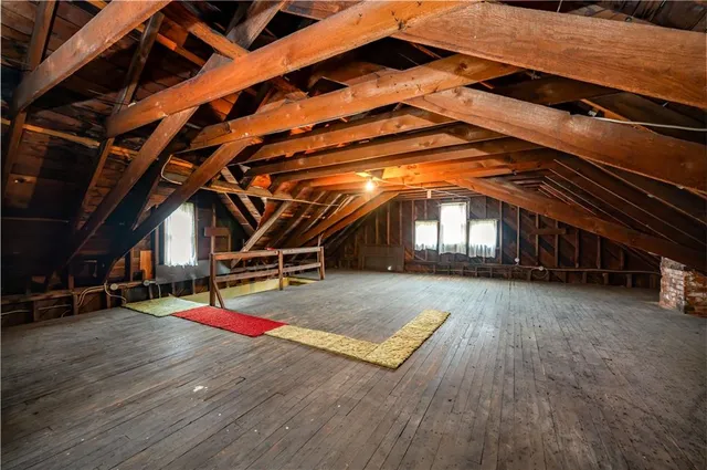 a view of under construction room and wooden floor