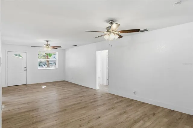 a view of a storage & utility room with a window