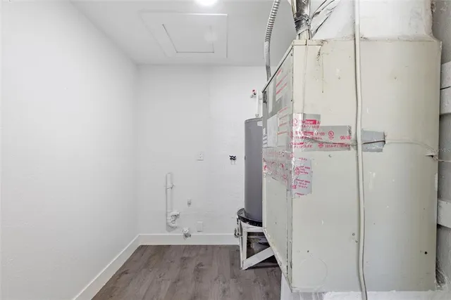 an aerial view of a houses with a yard