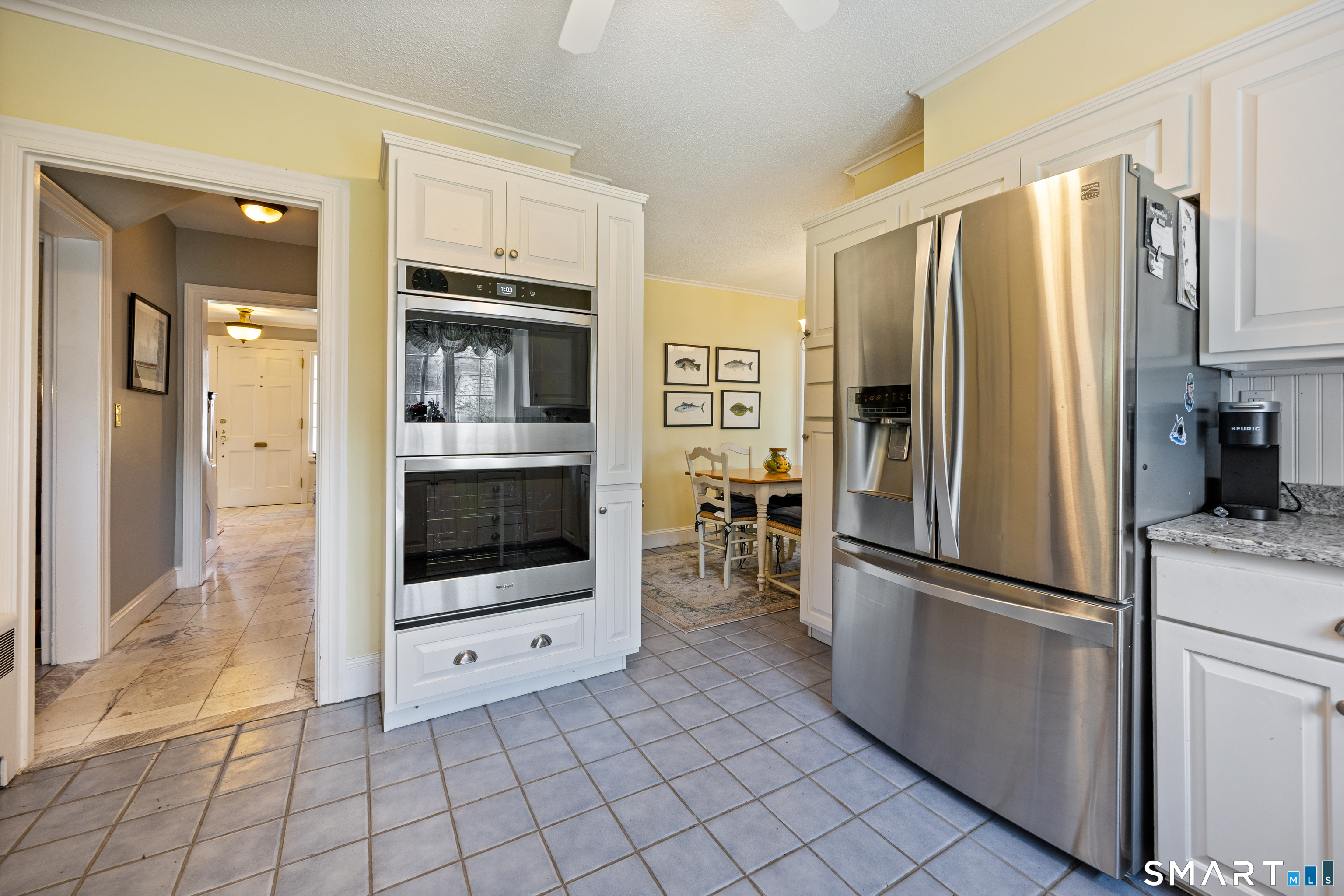 40 10 Acre Road New Britain, CT 06052 - Photo 6 of 38 a kitchen with granite countertop a refrigerator and a stove top oven