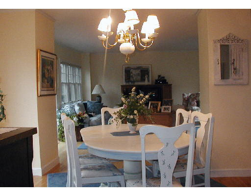29 Wainwright Road Winchester, MA 01890 - Photo 2 of 6 a view of a dining room with furniture and chandelier