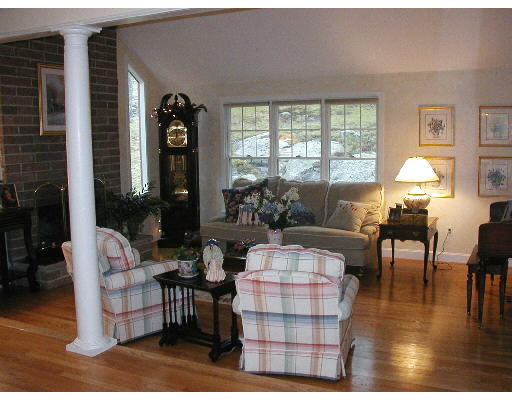 29 Wainwright Road Winchester, MA 01890 - Photo 3 of 6 a living room with furniture dining table and a large window