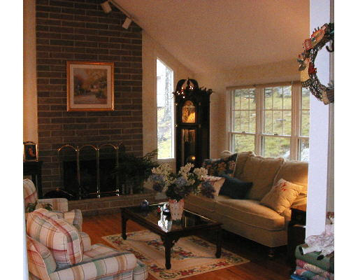 29 Wainwright Road Winchester, MA 01890 - Photo 4 of 6 a living room with furniture window and wooden floor