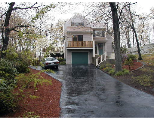 29 Wainwright Road Winchester, MA 01890 - Photo 5 of 6 a front view of a house with garden