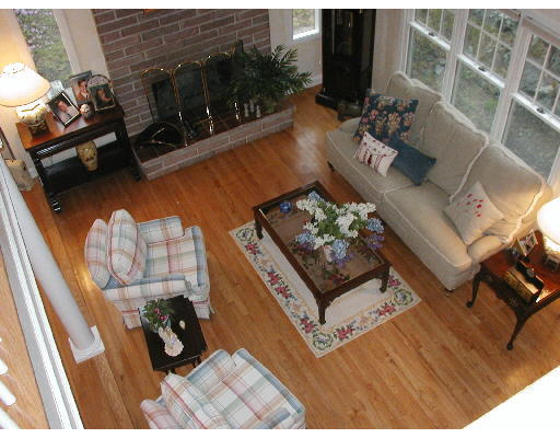 29 Wainwright Road Winchester, MA 01890 - Photo 6 of 6 a view of living room with furniture and a fireplace