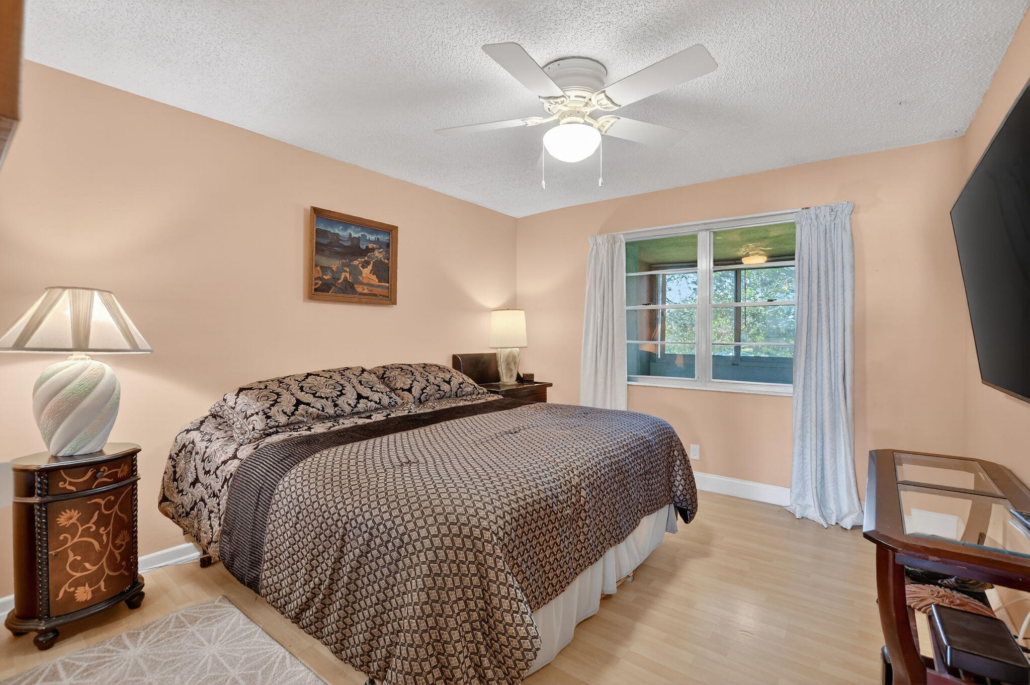326 Farnham O, Unit P Deerfield Beach, FL 33442 - Photo 12 of 86 a bedroom with a large bed and a window