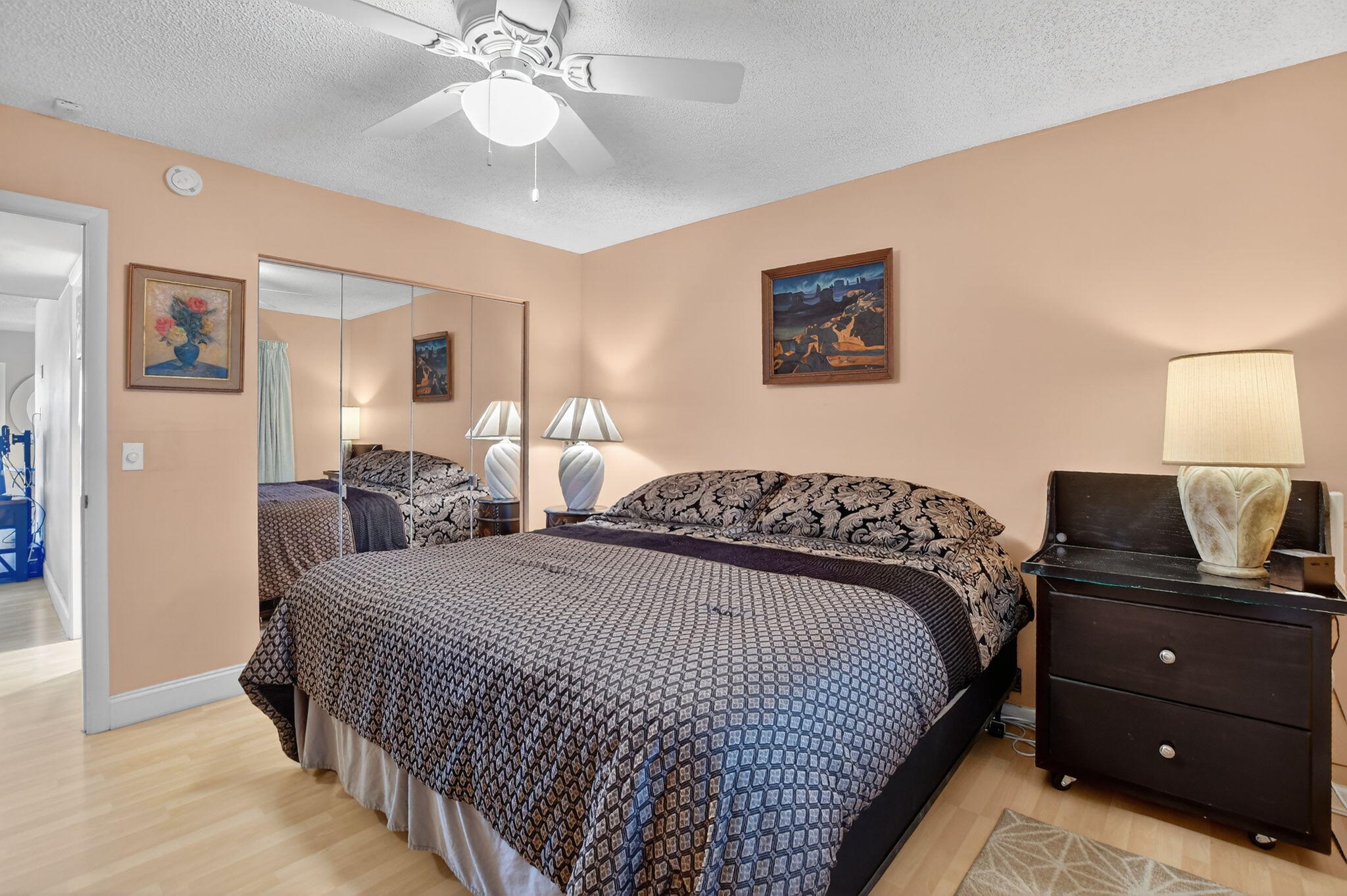 326 Farnham O, Unit P Deerfield Beach, FL 33442 - Photo 14 of 86 a bedroom with a bed and a chandelier