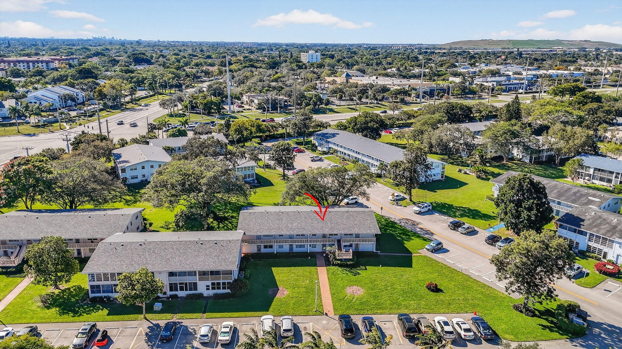 326 Farnham O, Unit P Deerfield Beach, FL 33442 - Photo 24 of 86 an aerial view of house with yard swimming pool and outdoor seating