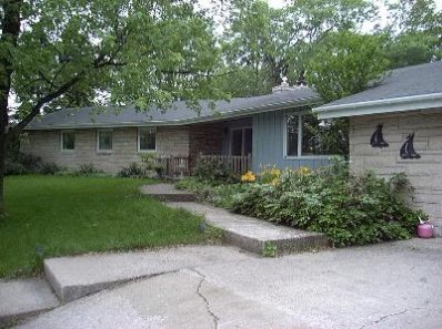 4 Summit Road Ogden Dunes, IN 46368 - Photo 1 of 1 a front view of house with yard and green space