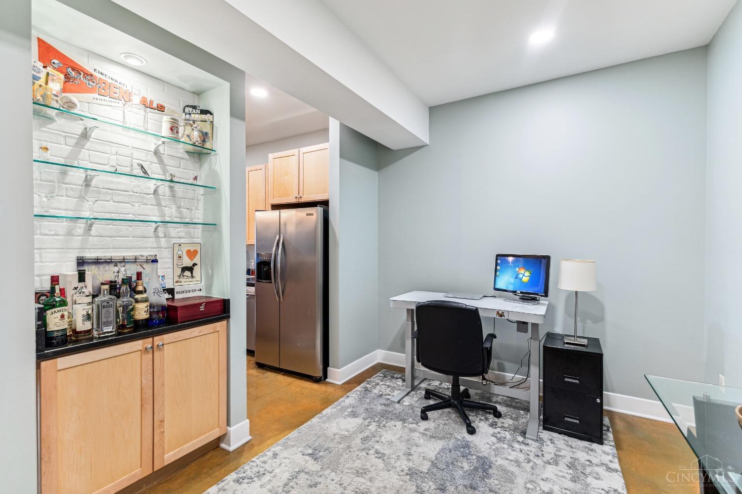 2260 Riverside Drive, Unit 205 Cincinnati, OH 45202 - Photo 8 of 37 This space also features a built-in etagere with glass shelving ideal to house a bar or to show off your art and decor...