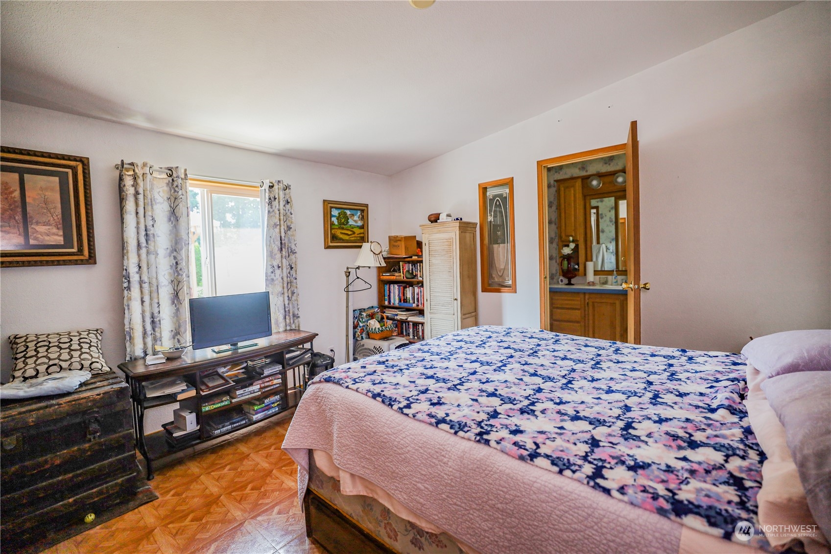 9 Poplar Road, Unit 33 Montesano, WA 98563 - Photo 12 of 18 a bedroom with a bed and a dresser