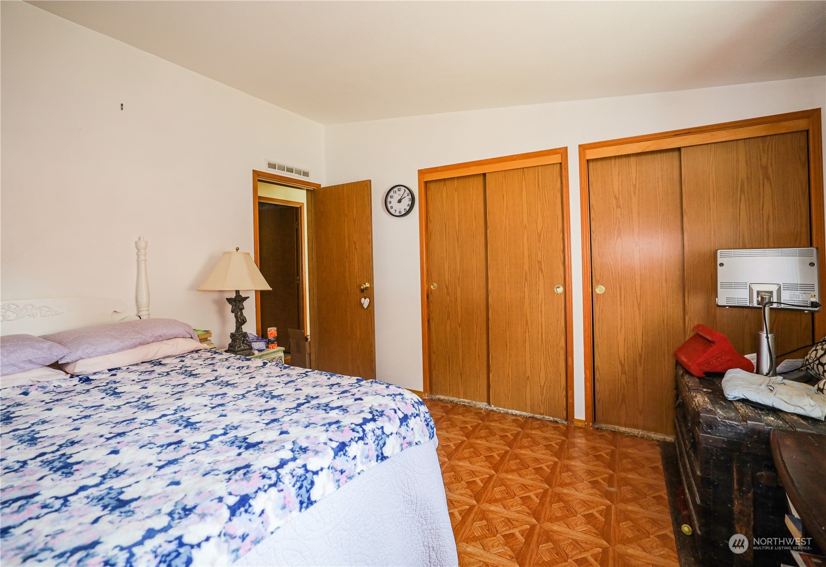9 Poplar Road, Unit 33 Montesano, WA 98563 - Photo 13 of 18 a bedroom with a bed and a lamp on dresser