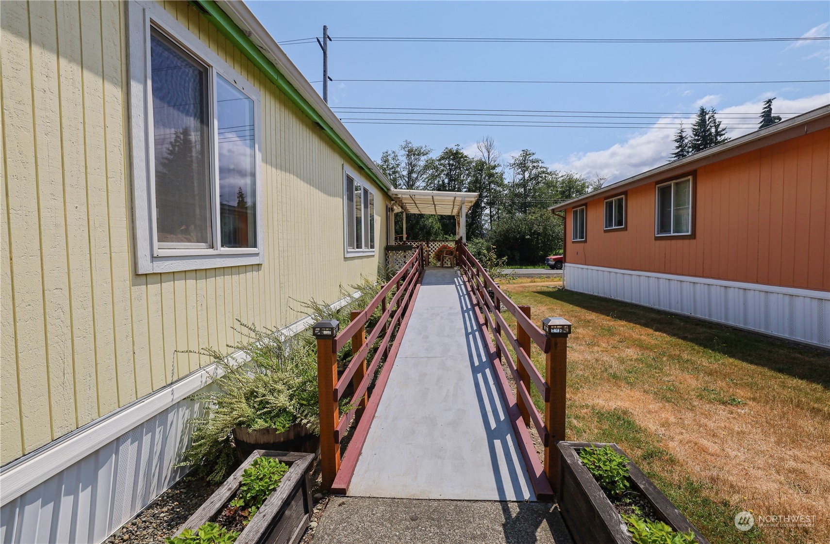9 Poplar Road, Unit 33 Montesano, WA 98563 - Photo 2 of 18 a view of outdoor space and deck